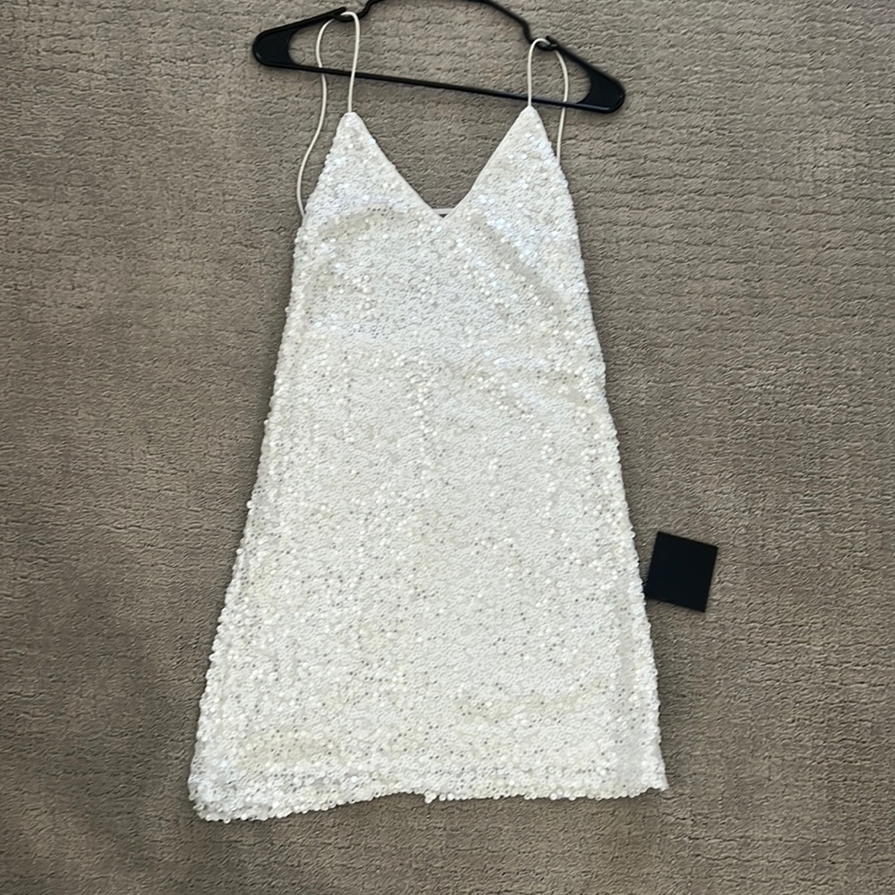 Lulus white shinny dress. Never worn.